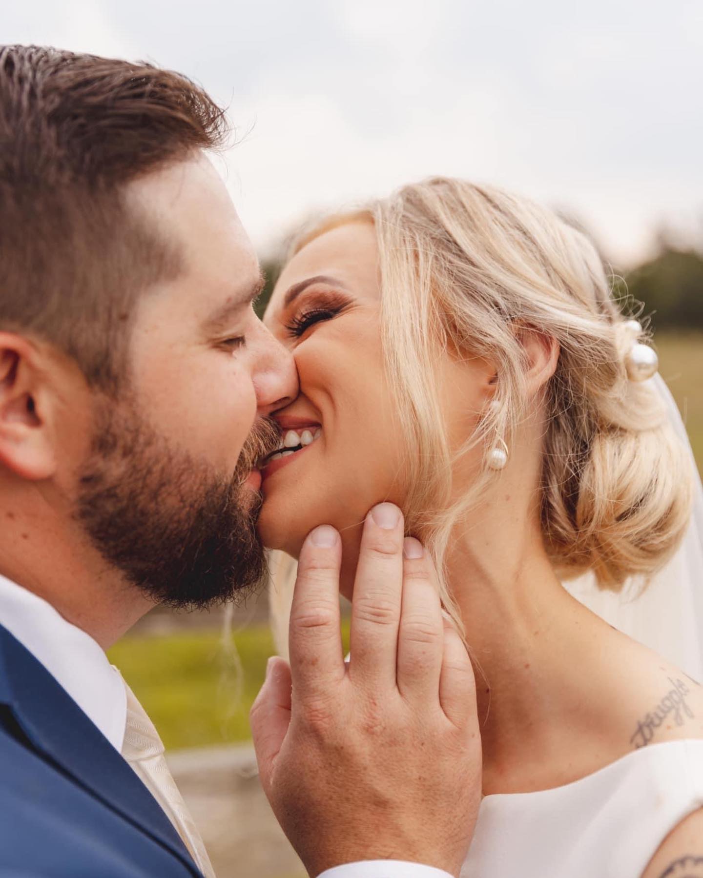 bride and groom kissing